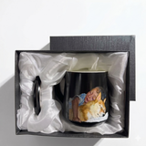 Black ceramic mug in gift box with a hand-painted pet portrait.